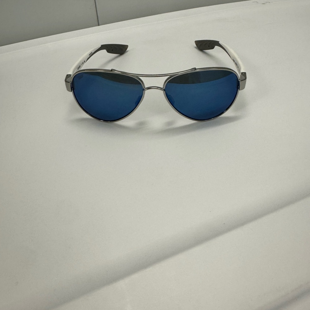 Costa Sunglasses with White Temples and Black Accents